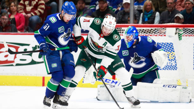 Troy Stecher and Zach Parise, Getty Images Troy Stecher and Zach Parise
