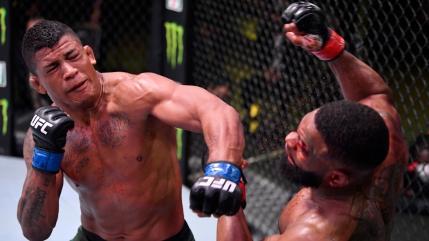 Gilbert Burns Tyron Woodley, Jeff Bottari/Zuffa LLC Gilbert Burns Tyron Woodley