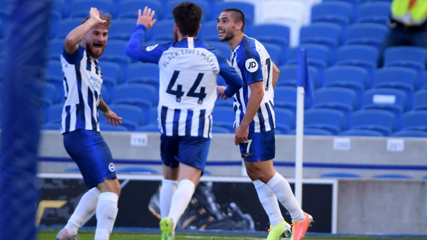 Neal Maupay, Brighton players celebrate, The Canadian Press Neal Maupay, Brighton players celebrate
