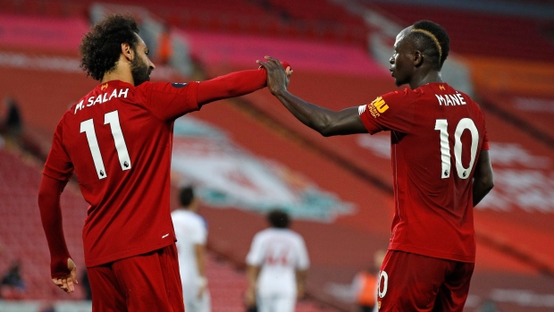 Sadio Mane and Mo Salah, The Canadian Press Sadio Mane and Mo Salah