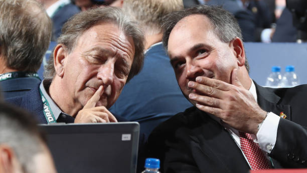 Eugene Melynk and Pierre Dorion, Getty Images Eugene Melynk and Pierre Dorion