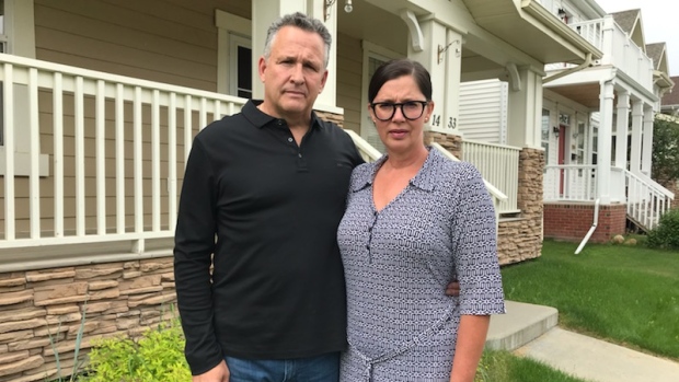 Former Western Hockey League player Brad Hammett and his wife, Kim, outside their home on Friday.