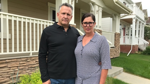 Former Western Hockey League player Brad Hammett and his wife, Kim, outside their home on Friday., CTV Former Western Hockey League player Brad Hammett and his wife, Kim, outside their home on Friday.