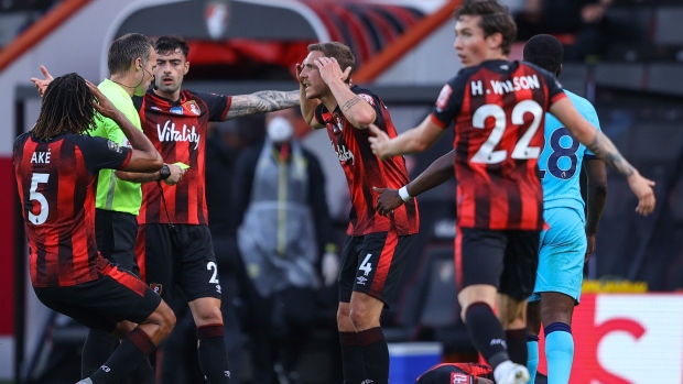Bournemouth players argue with ref