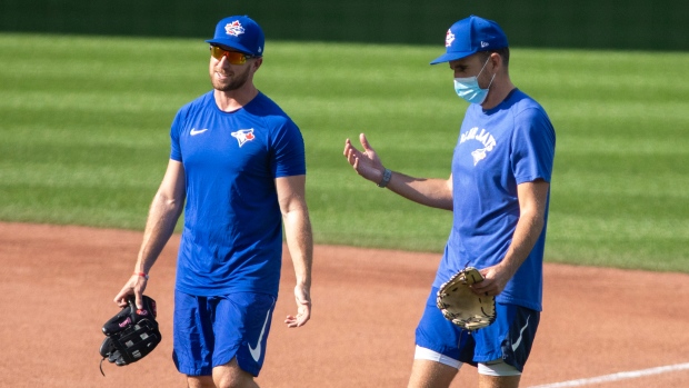Toronto Blue Jays' Patrick Kivlehan and a staff member, The Canadian Press Toronto Blue Jays' Patrick Kivlehan and a staff member