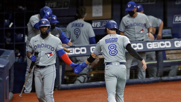 Cavan Biggio and Teoscar Hernandez , The Canadian Press Cavan Biggio and Teoscar Hernandez