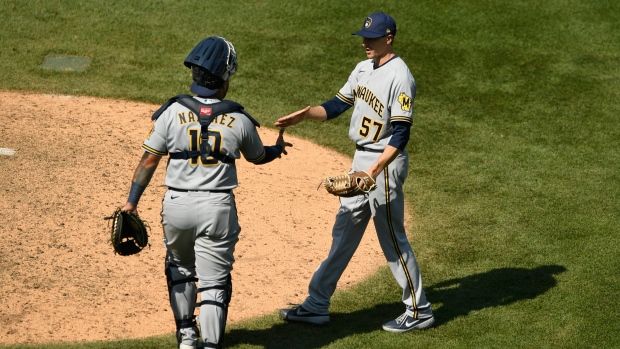 Eric Yardley celebrates with catcher Omar Narvaez, The Canadian Press Eric Yardley celebrates with catcher Omar Narvaez