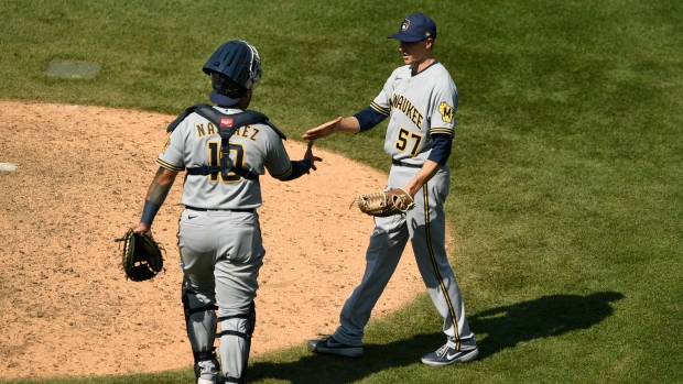 Eric Yardley celebrates with catcher Omar Narvaez