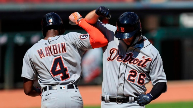 Detroit Tigers' C.J. Cron and Cameron Maybin, The Canadian Press Detroit Tigers' C.J. Cron and Cameron Maybin