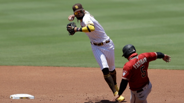 Fernando Tatis Jr. Eduardo Escobar