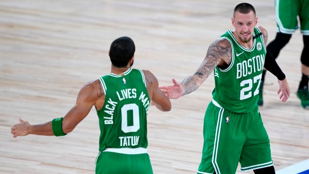 Jayson Tatum and Daniel Theis Jayson Tatum and Daniel Theis