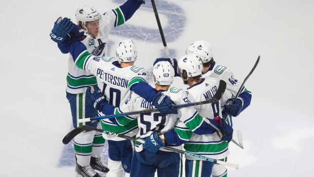 Vancouver Canucks celebrate, The Canadian Press Vancouver Canucks celebrate