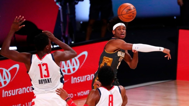 Shai Gilgeous-Alexander and Thomas Bryant , The Canadian Press Shai Gilgeous-Alexander and Thomas Bryant