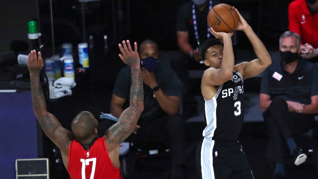Keldon Johnson and P.J. Tucker, The Canadian Press Keldon Johnson and P.J. Tucker
