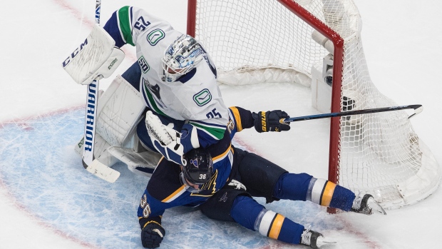 Vancouver Canucks' Jacob Markstrom and St. Louis Blues' Troy Brouwer, The Canadian Press Vancouver Canucks' Jacob Markstrom and St. Louis Blues' Troy Brouwer