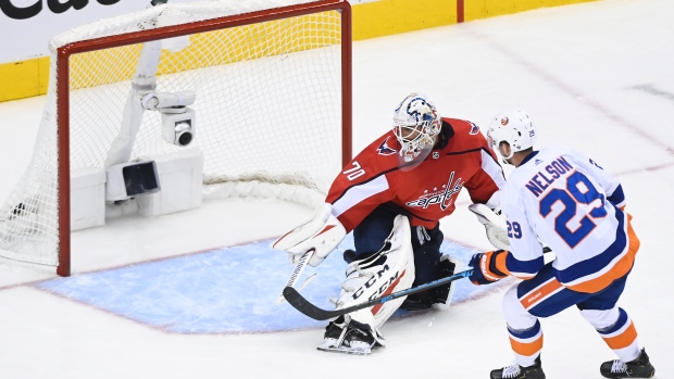 Brock Nelson and Braden Holtby, The Canadian Press Brock Nelson and Braden Holtby