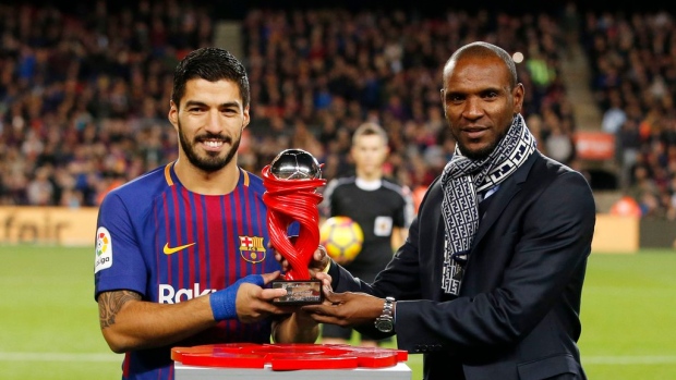 Luis Suarez and Eric Abidal