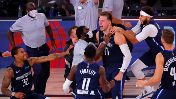 Dallas Mavericks celebrate, Kevin C. Cox/Getty Images Dallas Mavericks celebrate
