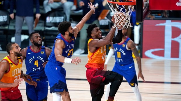 Donovan Mitchell scores against Jamal Murray and Denver Nuggets