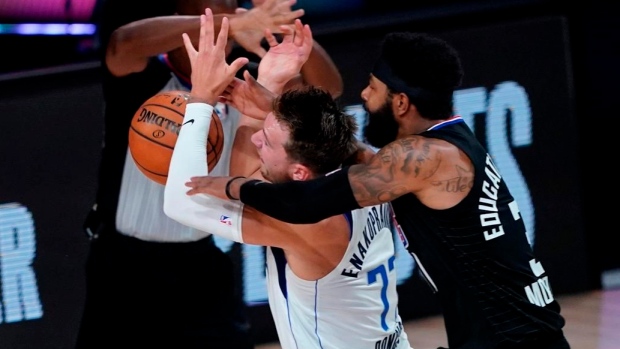 Luka Doncic Marcus Morris, The Canadian Press Luka Doncic Marcus Morris