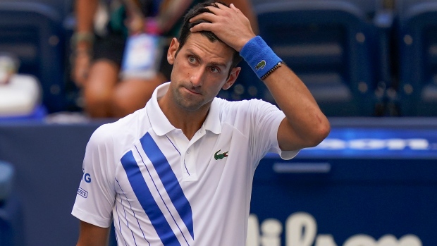 Djokovic fights virus to win in Paris; exhausted Sinner slams