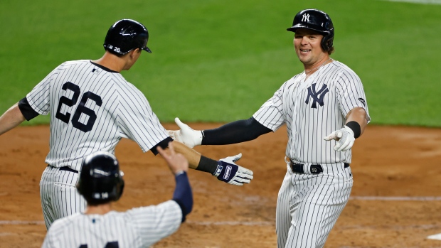 New York Yankees celebrate, The Canadian Press New York Yankees celebrate