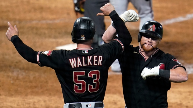 Kole Calhoun Christian Walker , The Canadian Press Kole Calhoun Christian Walker