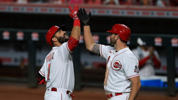 Eugenio Suarez celebrates with Mike Moustakas, The Canadian Press Eugenio Suarez celebrates with Mike Moustakas