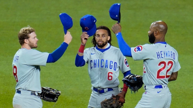 Chicago Cubs outfielders Ian Happ, left, Billy Hamilton (6), and Jason Heyward (22) celebrate, The Canadian Press Chicago Cubs outfielders Ian Happ, left, Billy Hamilton (6), and Jason Heyward (22) celebrate
