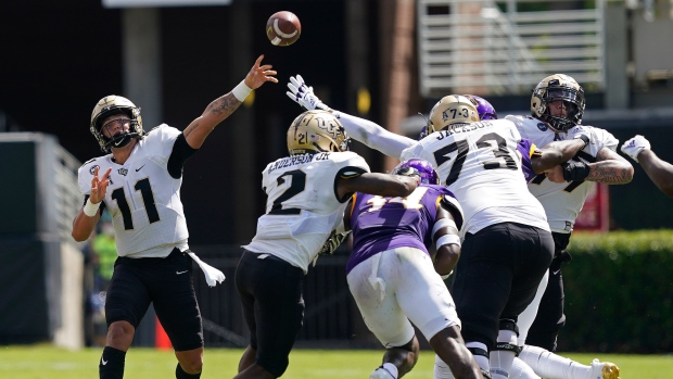 UCF's Dillon Gabriel (11) passes against East Carolina, The Canadian Press UCF's Dillon Gabriel (11) passes against East Carolina