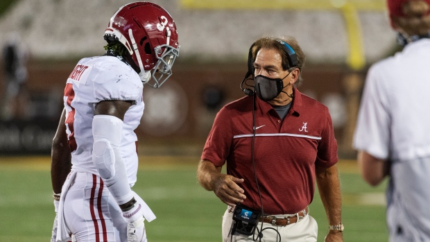 Nick Saban and Daniel Wright , The Canadian Press Nick Saban and Daniel Wright