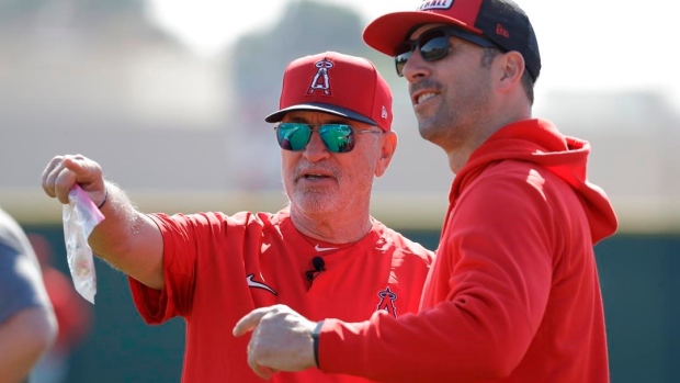 Joe Maddon and Billy Eppler, The Canadian Press Joe Maddon and Billy Eppler