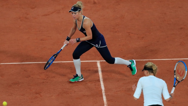Germany's Laura Siegemund and France's Kristina Mladenovic, The Canadian Press Germany's Laura Siegemund and France's Kristina Mladenovic