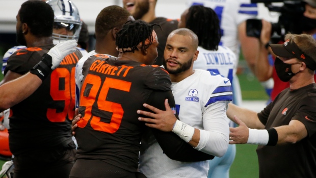 Myles Garrett and Dak Prescott