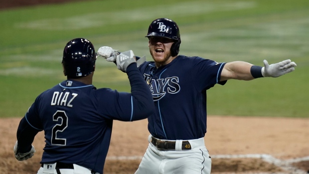 Tampa Bay Rays' Michael Brosseau and Yandy Diaz 