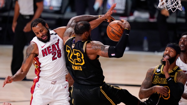 Miami Heat forward Andre Iguodala (28) sets up for a shot as