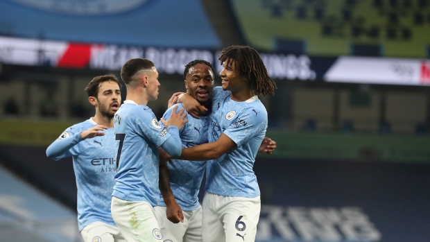 Manchester City's Raheem Sterling and team Celebrate , The Canadian Press Manchester City's Raheem Sterling and team Celebrate
