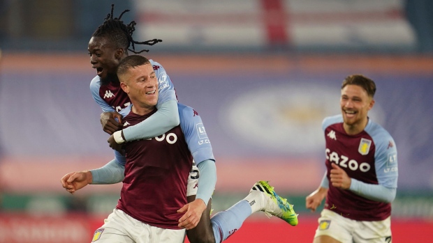 Aston Villa's Ross Barkley, bottom left, celebrates after scoring during the English Premier League 