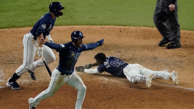 Tampa Bay Rays' Randy Arozarena scores , The Canadian Press Tampa Bay Rays' Randy Arozarena scores