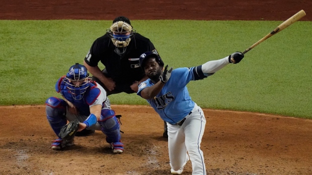 Rays' Randy Arozarena watches a RBI-single against Dodgers in Game 5 of World Series