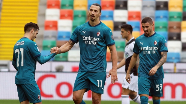 Zlatan Ibrahimovic (11) celebrates with AC Milan teammates Brahim Diaz (21) and Rade Krunic