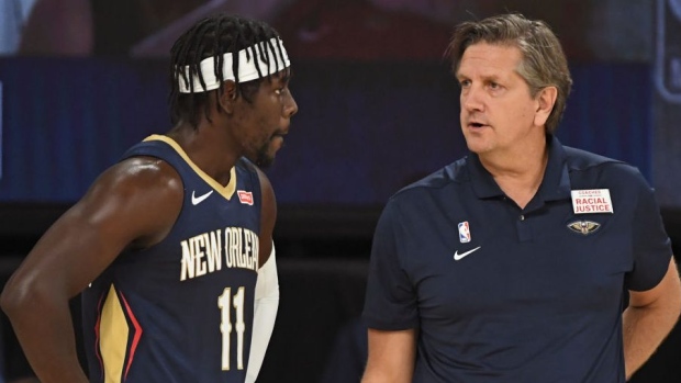 Jrue Holiday and Chris Finch, Getty Images Jrue Holiday and Chris Finch