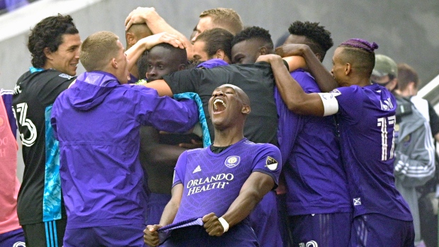 Orlando City's Kamal Miller and teammates celebrate , The Canadian Press Orlando City's Kamal Miller and teammates celebrate