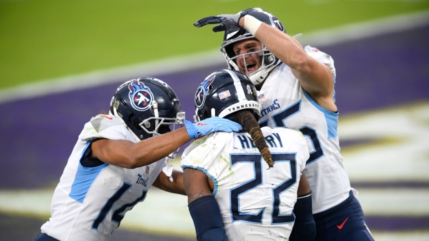 Tennessee Titans running back Derrick Henry celebrates with teammates , The Canadian Press Tennessee Titans running back Derrick Henry celebrates with teammates