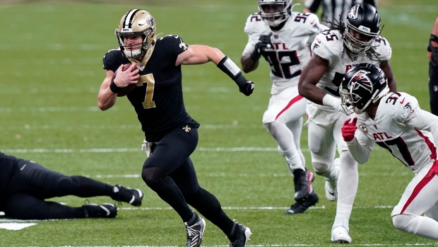 Taysom Hill, The Canadian Press Taysom Hill