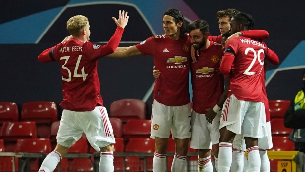 Manchester United's Bruno Fernandes celebrates with teammates , The Canadian Press Manchester United's Bruno Fernandes celebrates with teammates