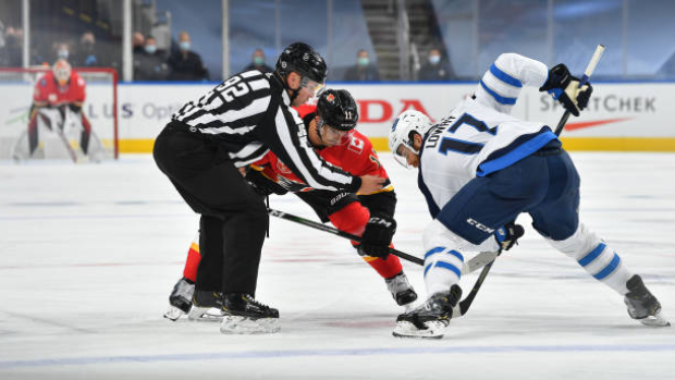 Mikael Backlund and Adam Lowry