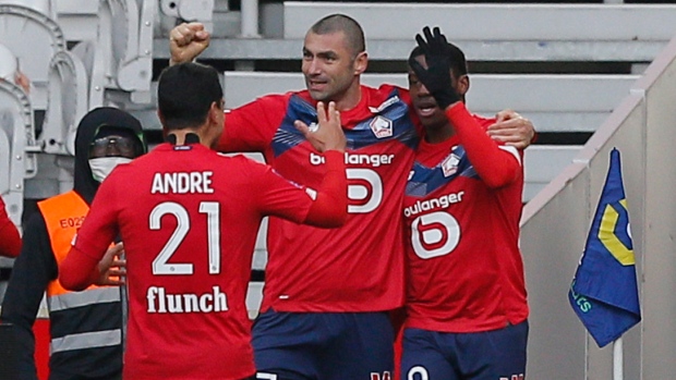 Lille celebrates with Jonathan David