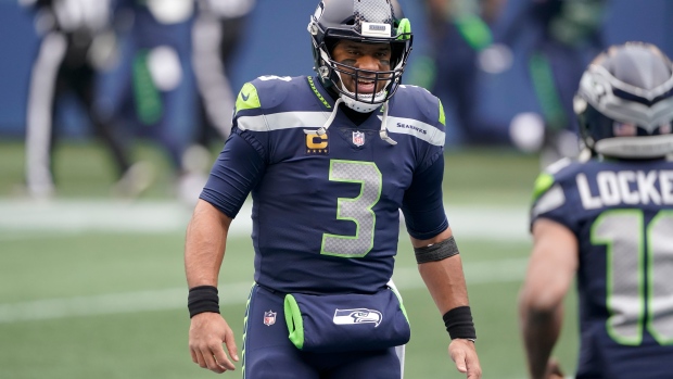 Russell Wilson and Tyler Lockett celebrate
