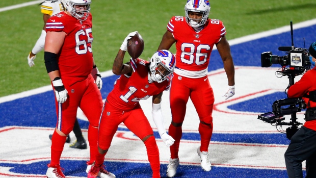 Buffalo Bills celebrate, The Canadain Press Buffalo Bills celebrate